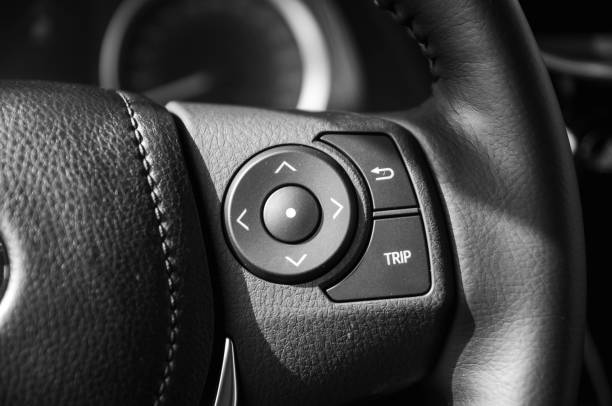 istock button steering wheel with shallow depth of field 600999224