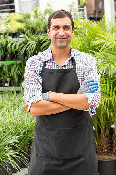 istock Male Florist working at a nursery 600999360