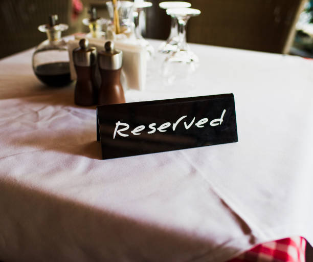 istock Reserved Sign on Table in A Restaurant 600999584