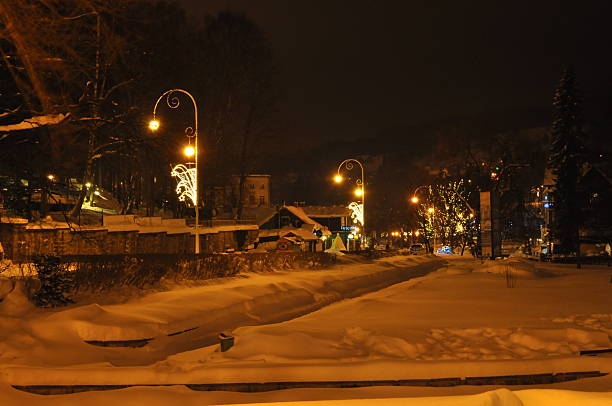 Winter, Christmas night in Krynica Zdroj in Poland. Winter night in the city.