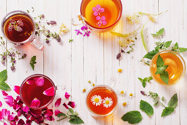 istock herbal tea on a white wooden background 601001876