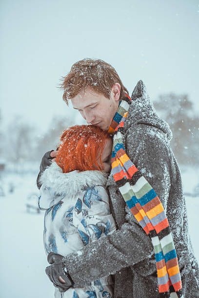 istock Happy Young Couple in Winter Park 601003172