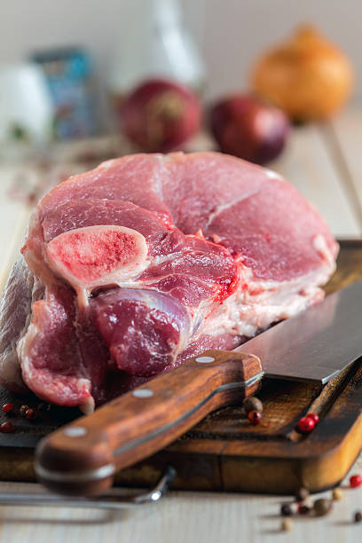 istock Piece of pork on a cutting board. 601003422
