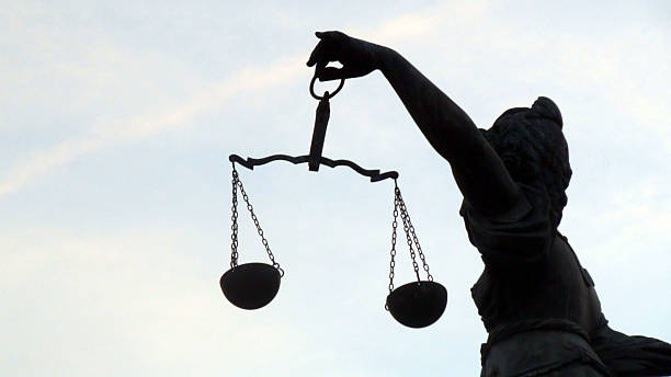 istock Lady Justice With Weight Scale Against Sky.Frankfurt 601005598