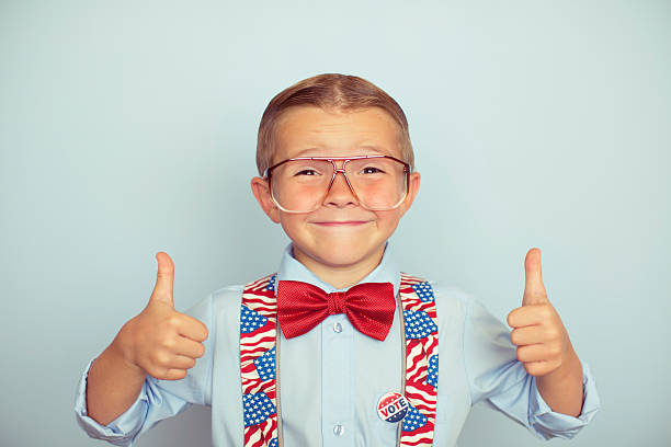 istock Young American Boy Thumbs up to Election Day 601007664