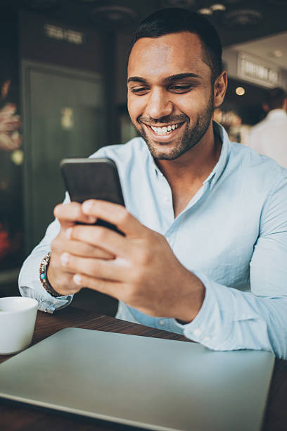 istock Young man with smart phone 601008224