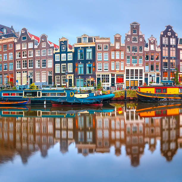 istock Amsterdam canal Singel with dutch houses 601009064