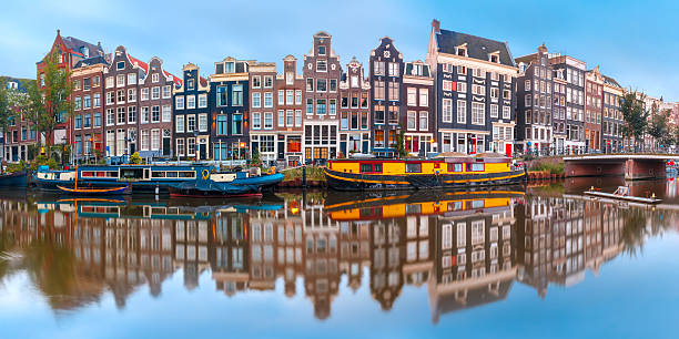 istock Amsterdam canal Singel with dutch houses 601009096