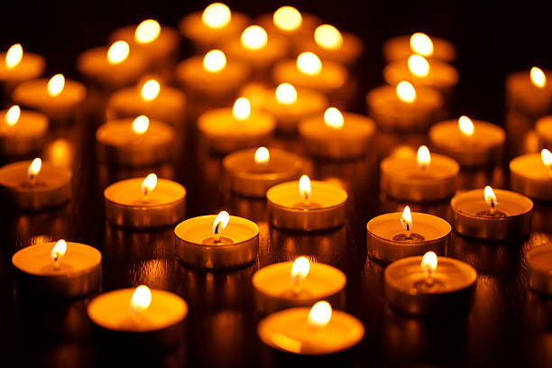 istock Many burning candles with shallow depth of field 601010296