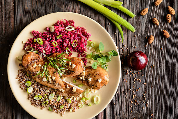 istock Baked chicken breast with buckwheat, beetroot and onion 601010350