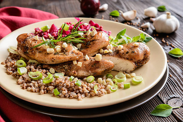 istock Baked chicken breast with buckwheat, beetroot and onion 601010540