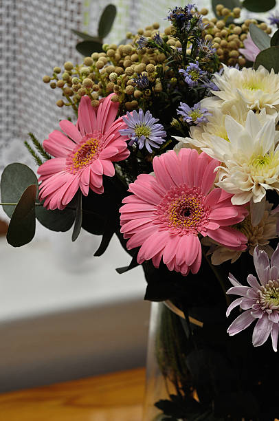 istock Pink Gerberas in a bouquet with colorful flowers 601012678