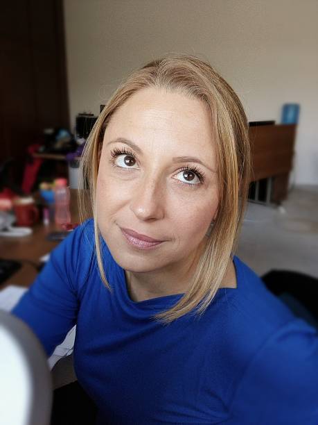 istock Beautiful blond at her desk 601014872