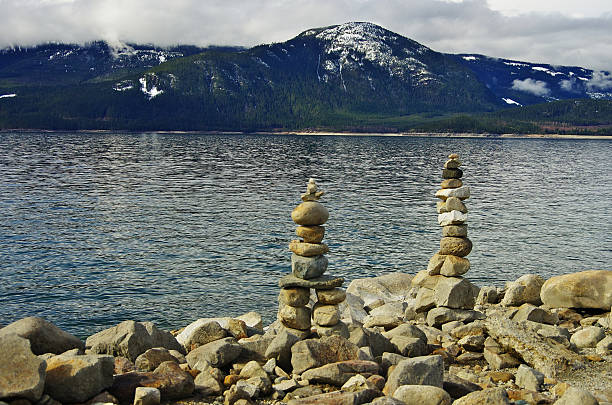 istock Stacked pebble on the lake shore 601015434
