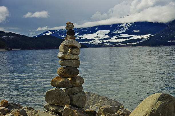 istock Stacked pebble on the lake shore 601015472