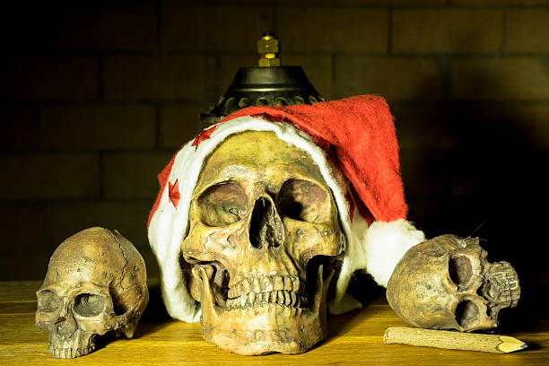 istock Still life with skull in christmas day, dark concept 601016230