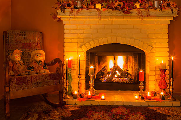 istock Cozy fireplace setting with rocking chair  in Autumn Colors 601016822