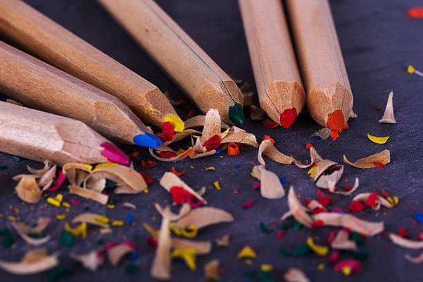 istock Coloured pencils and shavings against a black background 601020626
