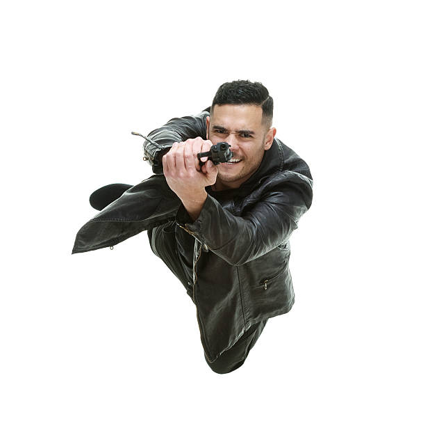 Above view of man in action with gunhttp://www.twodozendesign.info/i/1.png