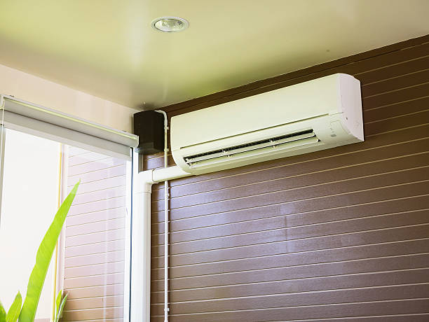 istock Air conditioner on the brown wall background 601023006