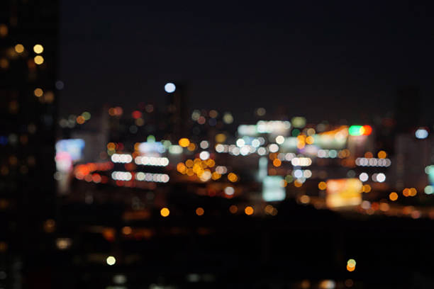 istock blur photo with bokeh light of high building 601023606