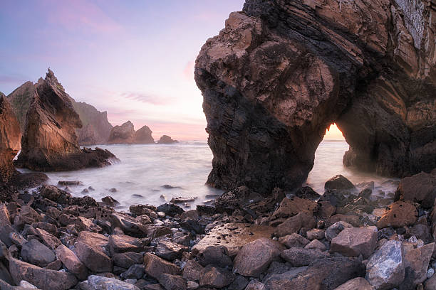 istock Twilight at rocky coastline of Atlantic ocean 601025370