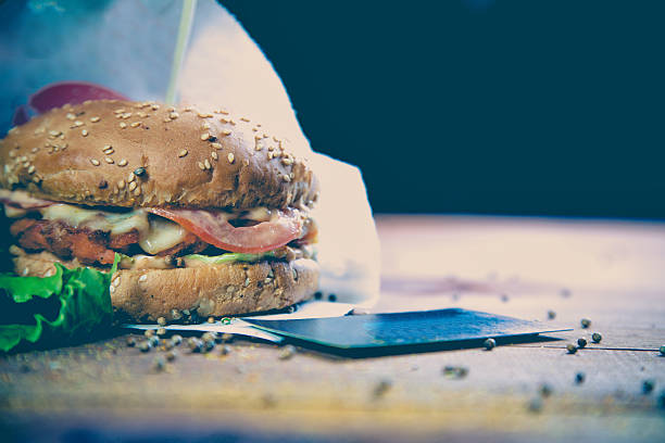 istock Delicious burger bun with white on the bar 601028650
