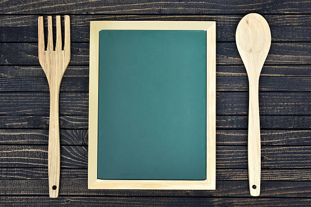 Fork and spoon on table stock photo