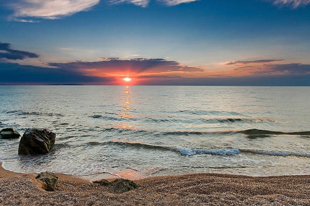istock sunset over the sea and sky with clouds 601029806