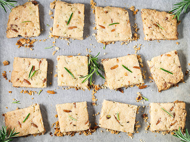 istock Freshly baked cookies with rosemary and pine nuts 601030034