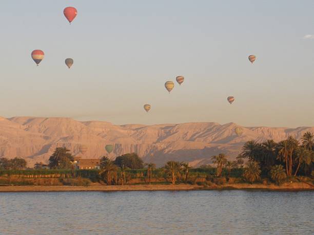 istock Hot air balloons over River Nile 601030472