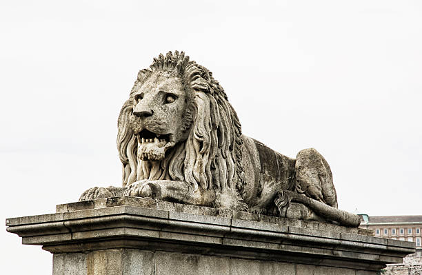 istock Lion stone statue in Budapest, Hungary 601032360