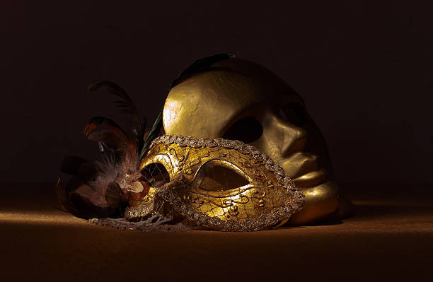 istock Two golden Venetian masks 601033972