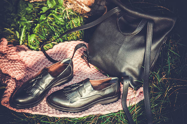 istock black leather shoes and a backpack, women's shoes 601034066