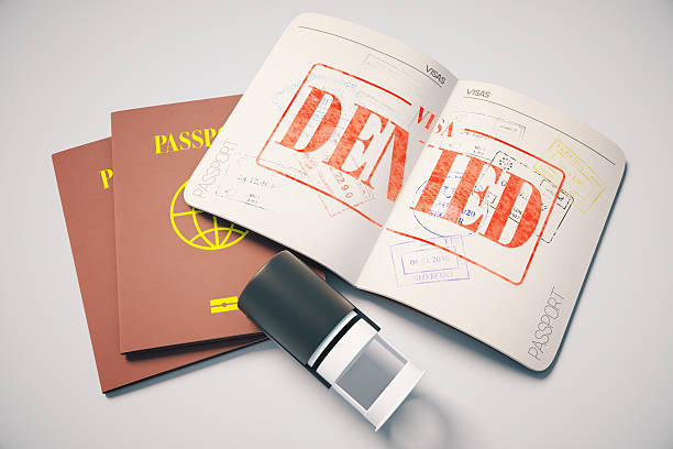 Passport with denied visa stock photo