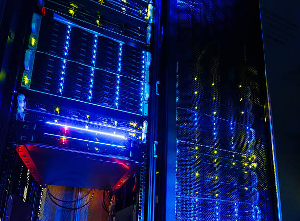 istock Server room colocation with several cabinets, switches and gateways. 601035948