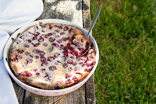 istock Cherry clafoutis. Homemade cherry pie on rustic background 601036042