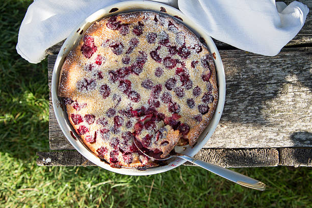 istock Cherry clafoutis. Homemade cherry pie on rustic background 601036524