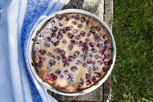 istock Cherry clafoutis. Homemade cherry pie on rustic background 601037172
