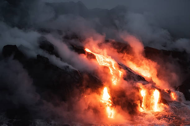 istock Molten lava flowing into the Pacific Ocean 601038232