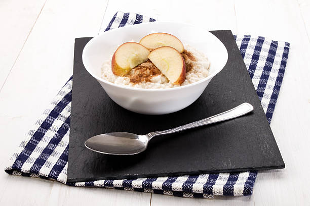 istock irish breakfast with porridge, cinnamon, sugar and apple pieces 601106522