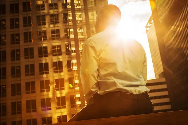 Photo of Businessman Bathed in Sunlight