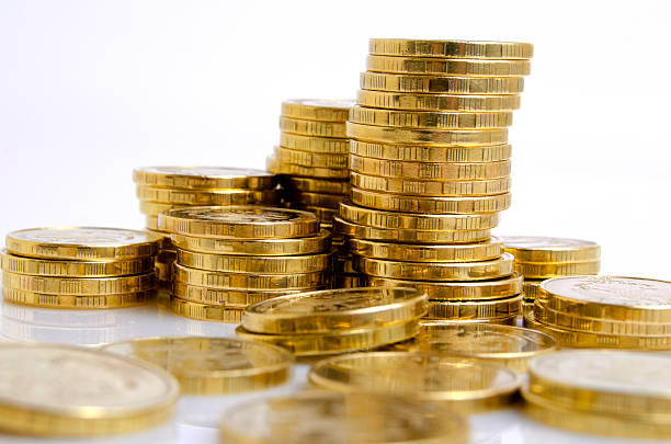 istock Coins from yellow metal. 601116970