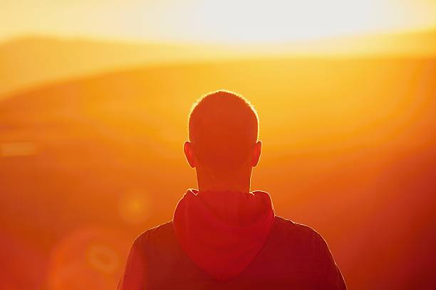 istock Silhouette of the man on the mountain top 601117628