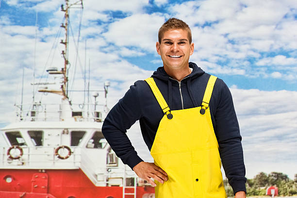 istock Smiling worker standing at the fishing industry 601120670