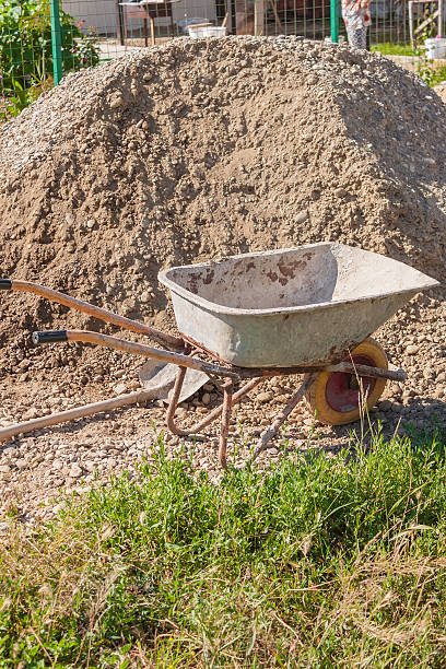 istock Construction truck standing on the grass 601121214