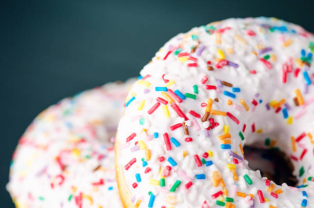 istock Donut with sprinkles and white iced. 601123904