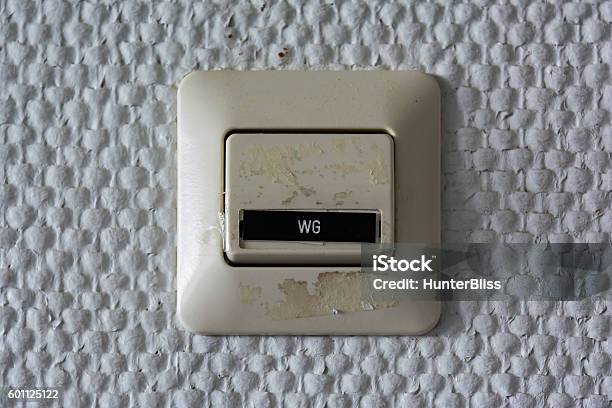 Wg Wohngemeinschaft Label Switch Wall Plastic Closeup Detail Texture Architectural Stock Photo - Download Image Now