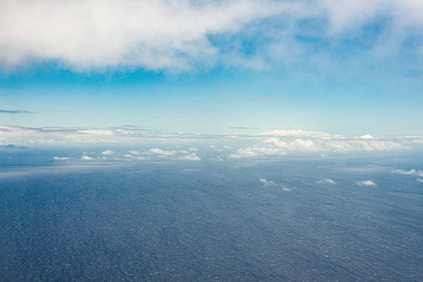 istock Blue sea and sky with clouds 601126186