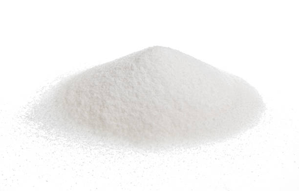 istock Pile of sugar isolated on white 601127066
